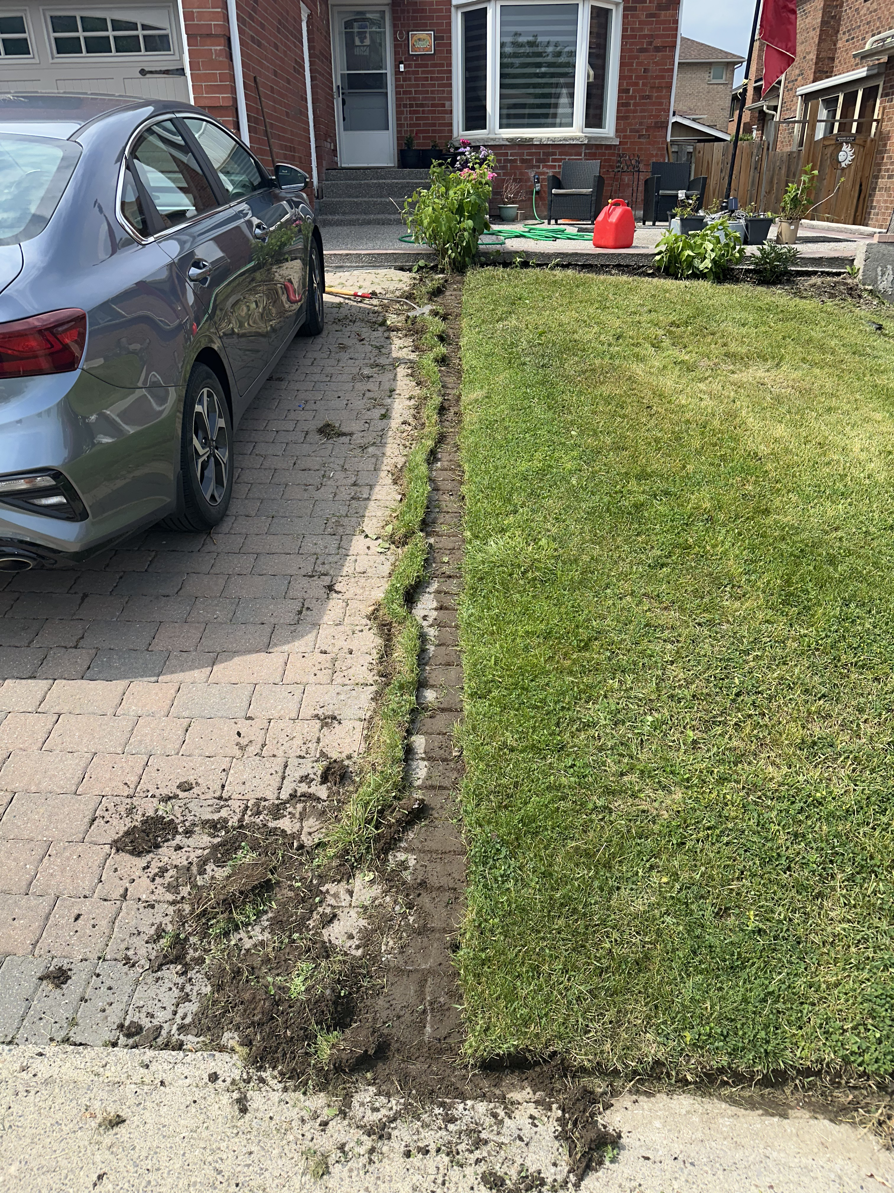 Lawn edge and walkway reset before